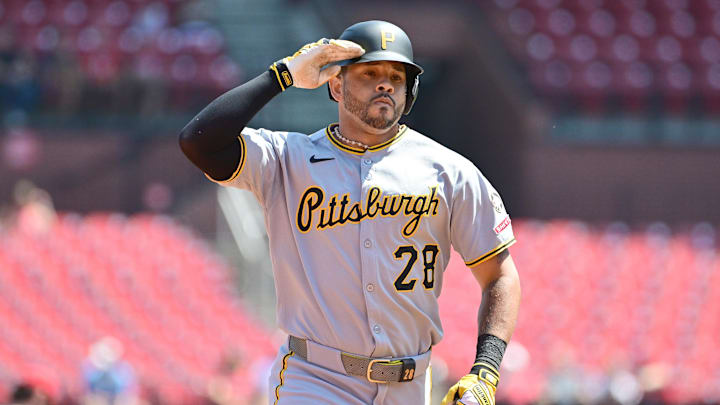 Aug 28, 2025; St. Louis, Missouri, USA;  Pittsburgh Pirates left fielder Tommy Pham (28) salutes teammates in the dugout after hitting a solo home run against the St. Louis Cardinals during the first inning at Busch Stadium. Mandatory Credit: Tim Vizer-Imagn Images