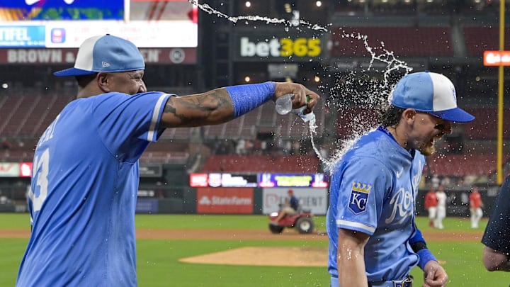 Jun 3, 2025; St. Louis, Missouri, USA;  Kansas City Royals shortstop Bobby Witt Jr. (7) is doused with water by catcher Salvador Perez (13) after the Royals defeated the St. Louis Cardinals at Busch Stadium. Mandatory Credit: Jeff Curry-Imagn Images