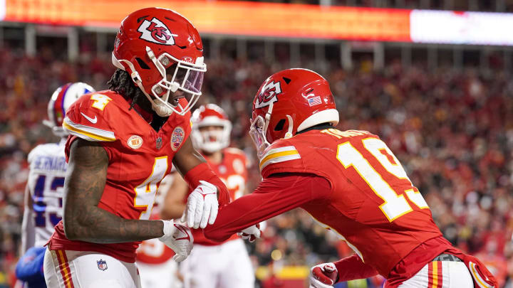 Dec 10, 2023; Kansas City, Missouri, USA; Kansas City Chiefs wide receiver Rashee Rice (4) celebrates with wide receiver Kadarius Toney (19) after scoring against the Buffalo Bills during the first half at GEHA Field at Arrowhead Stadium. Mandatory Credit: Denny Medley-USA TODAY Sports