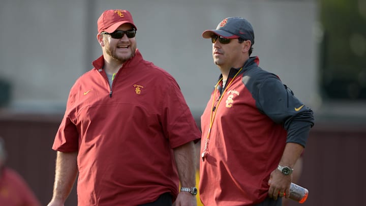 Kyle DeVan (left) with Steve Sarkisian at USC spring practices. Kyle DeVan (left) with Steve Sarkisian at USC spring practices.