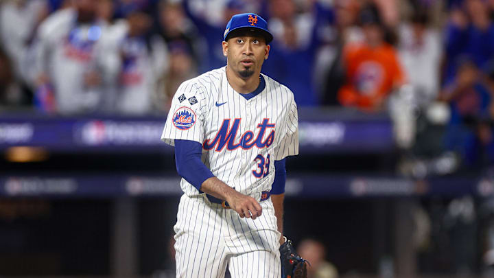 Oct 18, 2024; New York City, New York, USA; New York Mets relief pitcher Edwin Diaz (39) reacts after striking out Los Angeles Dodgers designated hitter Shohei Ohtani, not pictured during the eighth inning during game five of the NLCS for the 2024 MLB playoffs at Citi Field. Mandatory Credit: Vincent Carchietta-Imagn Images