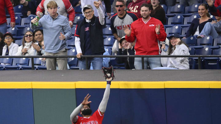 May 12, 2026; Cleveland, Ohio, USA; Los Angeles Angels right fielder Jo Adell (7) makes a catch at the wall in the fifth inning against the Cleveland Guardians at Progressive Field. Mandatory Credit: David Richard-Imagn Images May 12, 2026; Cleveland, Ohio, USA; Los Angeles Angels right fielder Jo Adell (7) makes a catch at the wall in the fifth inning against the Cleveland Guardians at Progressive Field. Mandatory Credit: David Richard-Imagn Images