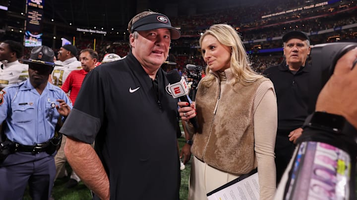 Nov 28, 2025; Atlanta, Georgia, USA; Georgia Bulldogs head coach Kirby Smart talks to reporter Katie George after a victory over the Georgia Tech Yellow Jackets at Mercedes-Benz Stadium. Mandatory Credit: Brett Davis-Imagn Images
