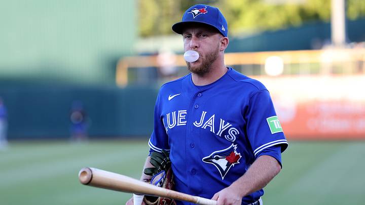 Blue Jays left fielder Myles Straw (3) walks toward the dugout while blowing a bubble with chewing gum and holding a bat before a game against the Athletics. Credit: Dennis Lee-Imag Blue Jays left fielder Myles Straw (3) walks toward the dugout while blowing a bubble with chewing gum and holding a bat before a game against the Athletics. Credit: Dennis Lee-Imag