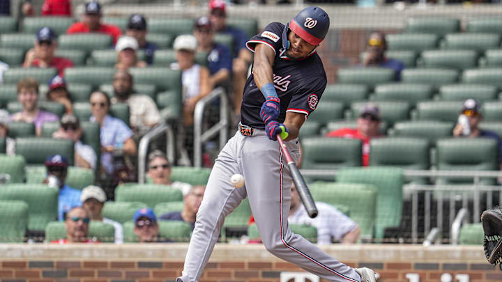 Sep 24, 2025; Cumberland, Georgia, USA; Washington Nationals left fielder James Wood (29) hits a home run against the Atlanta Braves during the eighth inning at Truist Park. Sep 24, 2025; Cumberland, Georgia, USA; Washington Nationals left fielder James Wood (29) hits a home run against the Atlanta Braves during the eighth inning at Truist Park.
