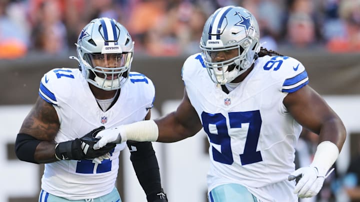 Dallas Cowboys stars Micah Parsons celebrates with defensive tackle Osa Odighizuwa after a sack against the Cleveland Browns.