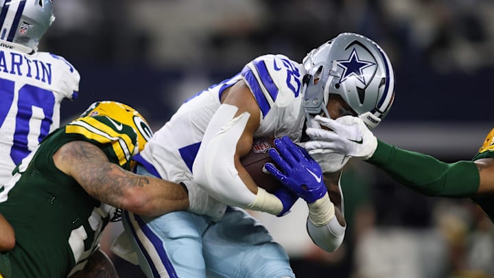 Jan 14, 2024; Arlington, Texas, USA; Dallas Cowboys running back Tony Pollard (20) rushes the ball