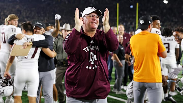 Sep 13, 2025; South Bend, Indiana, USA; Texas A&M Aggies head coach Mike Elko celebrates after the game against Notre Dame Fighting Irish at Notre Dame Stadium. Mandatory Credit: Trevor Ruszkowski-Imagn Images