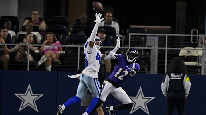 Dallas Cowboys cornerback Zion Childress breaks up a pass intended for Baltimore Ravens wide receiver Malik Cunningham.