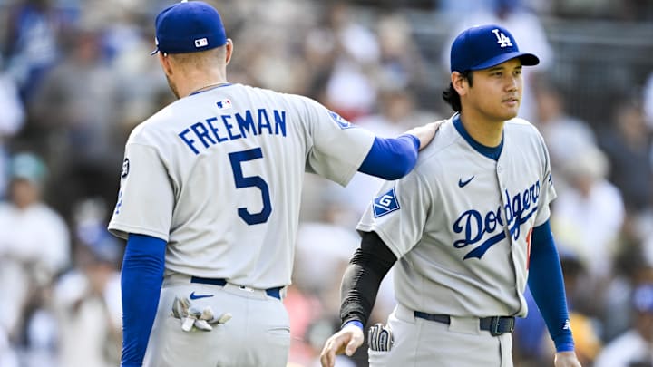 Aug 24, 2025; San Diego, California, USA; Los Angeles Dodgers first baseman Freddie Freeman (5) and Shohei Ohtani (17) celebrate after the Dodgers beat the San Diego Padres at Petco Park. Mandatory Credit: Denis Poroy-Imagn Images
