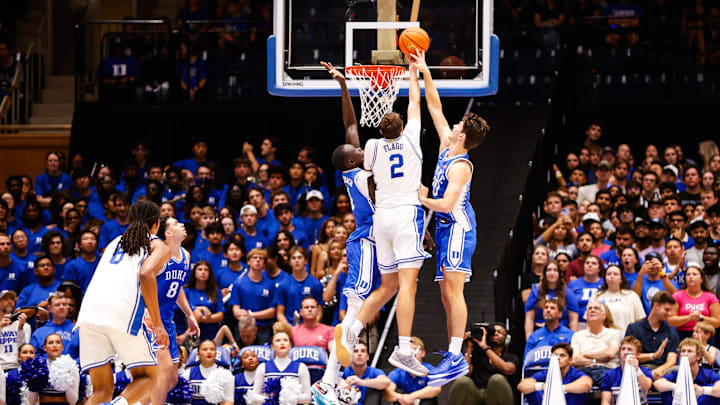 Oct 4, 2024; Durham, NC, USA; Duke Blue Devils center Stanley Borden (52) blocks guard Cooper Flagg (2) dunk during Countdown to Craziness at Cameron Indoor Stadium. Mandatory Credit: Jaylynn Nash-Imagn Images