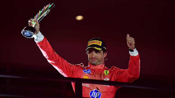 Nov 23, 2024; Las Vegas, Nevada, USA; Scuderia Ferrari driver Carlos Sainz (55) celebrates after placing third in the Las Vegas Grand Prix at Las Vegas Circuit. Mandatory Credit: Gary A. Vasquez-Imagn Images