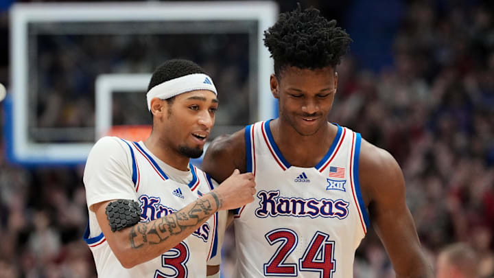 Feb 22, 2025; Lawrence, Kansas, USA; Kansas Jayhawks guard Dajuan Harris Jr. (3) celebrates with forward KJ Adams Jr. (24) after a score against the Oklahoma State Cowboys during the first half at Allen Fieldhouse. Mandatory Credit: Denny Medley-Imagn Images