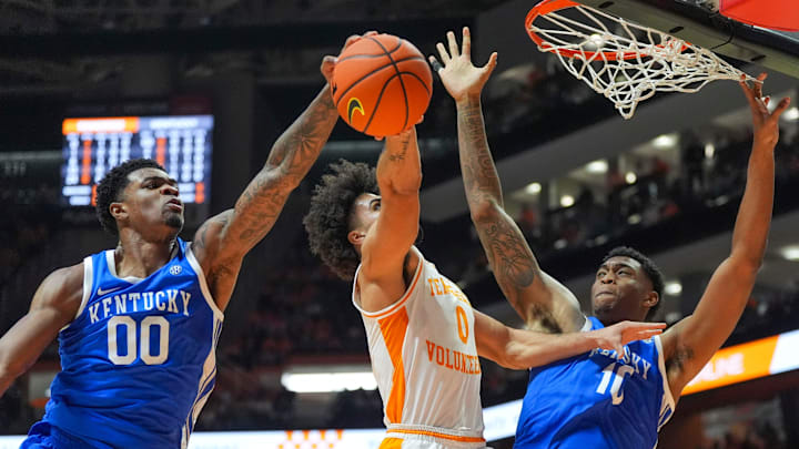 Kentucky guard Otega Oweh (00) and Kentucky forward Brandon Garrison (10) block the basket from Tennessee guard Ja'Kobi Gillespie (0) during a NCAA basketball game between the Tennessee Volunteers and Kentucky Wildcats at Thompson-Boling Arena at Food City Center in Knoxville, Tenn., on Jan. 17, 2026.