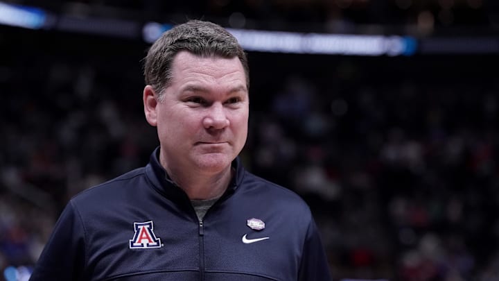 Mar 23, 2024; Salt Lake City, UT, USA; Arizona Wildcats head coach Tommy Lloyd reacts after