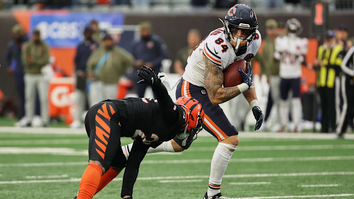 Bears tight end Colston Loveland runs with the ball for a 58-yard touchdown play against Cincinnati safety Jordan Battle. Bears tight end Colston Loveland runs with the ball for a 58-yard touchdown play against Cincinnati safety Jordan Battle.