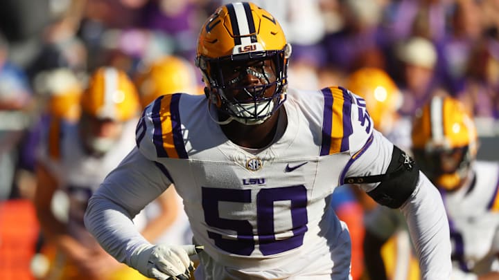 Nov 16, 2024; Gainesville, Florida, USA; LSU Tigers offensive lineman Emery Jones Jr. (50) warms up prior to the game against the Florida Gators at Ben Hill Griffin Stadium. Mandatory Credit: Kim Klement Neitzel-Imagn Images Nov 16, 2024; Gainesville, Florida, USA; LSU Tigers offensive lineman Emery Jones Jr. (50) warms up prior to the game against the Florida Gators at Ben Hill Griffin Stadium. Mandatory Credit: Kim Klement Neitzel-Imagn Images