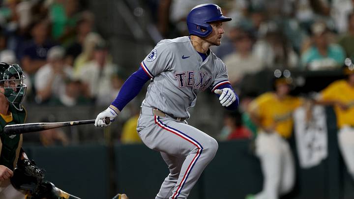 Aug 15, 2026; West Sacramento, California, USA; Texas Rangers pinch hitter Jarred Kelenic (25) hits a two RBI single against the Athletics during the ninth inning at Sutter Health Park. Mandatory Credit: Dennis Lee-Imagn Images Aug 15, 2026; West Sacramento, California, USA; Texas Rangers pinch hitter Jarred Kelenic (25) hits a two RBI single against the Athletics during the ninth inning at Sutter Health Park. Mandatory Credit: Dennis Lee-Imagn Images