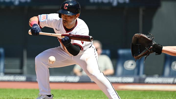 Jun 28, 2026: Cleveland Guardians center fielder Steven Kwan (38) hits a bunt single during the fifth inning against the Seattle Mariners at Progressive Field. 