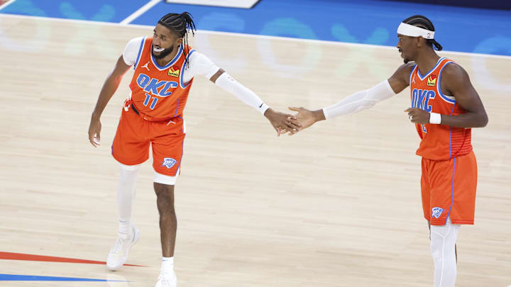 Nov 11, 2024; Oklahoma City, Oklahoma, USA; Oklahoma City Thunder guard Isaiah Joe (11) and guard Shai Gilgeous-Alexander (2) high five before the start of a game against the Los Angeles Clippers at Paycom Center. Mandatory Credit: Alonzo Adams-Imagn Images Nov 11, 2024; Oklahoma City, Oklahoma, USA; Oklahoma City Thunder guard Isaiah Joe (11) and guard Shai Gilgeous-Alexander (2) high five before the start of a game against the Los Angeles Clippers at Paycom Center. Mandatory Credit: Alonzo Adams-Imagn Images
