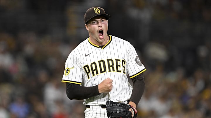 Sep 9, 2025; San Diego, California, USA; San Diego Padres relief pitcher Mason Miller (22) celebrates after striking out a batter during the eighth inning against the Cincinnati Reds at Petco Park. Mandatory Credit: Denis Poroy-Imagn Images Sep 9, 2025; San Diego, California, USA; San Diego Padres relief pitcher Mason Miller (22) celebrates after striking out a batter during the eighth inning against the Cincinnati Reds at Petco Park. Mandatory Credit: Denis Poroy-Imagn Images
