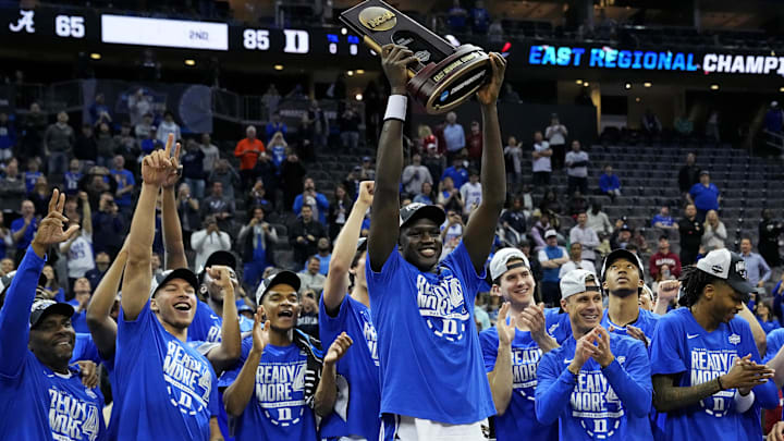 Mar 29, 2025; Newark, NJ, USA; Duke Blue Devils center Khaman Maluach (9) raise the East Region trophy after beating the Alabama Crimson Tide in the East Regional final of the 2025 NCAA tournament at Prudential Center. Mandatory Credit: Robert Deutsch-Imagn Images Mar 29, 2025; Newark, NJ, USA; Duke Blue Devils center Khaman Maluach (9) raise the East Region trophy after beating the Alabama Crimson Tide in the East Regional final of the 2025 NCAA tournament at Prudential Center. Mandatory Credit: Robert Deutsch-Imagn Images