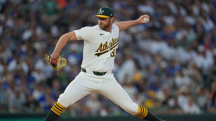 Jun 29, 2026; West Sacramento, California, USA; Athletics pitcher Matt Krook (65) delivers a pitch against the Los Angeles Dodgers in the sixth inning at Sutter Health Park. Mandatory Credit: Cary Edmondson-Imagn Images