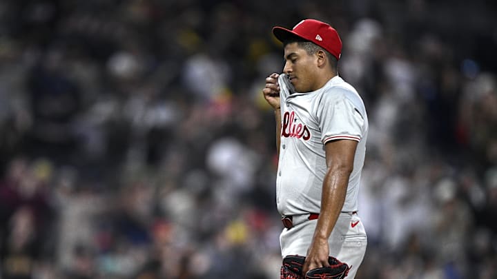 Apr 27, 2024; San Diego, California, USA; Philadelphia Phillies starting pitcher Ranger Suárez (55) wipes his face after a home run hit by San Diego Padres third baseman Eguy Rosario (not pictured) during the eighth inning at Petco Park.