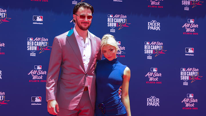Jul 15, 2025; Atlanta, GA, USA; National League pitcher Paul Skenes (30) of the Pittsburgh Pirates and social media influencer Livvy Dunne pose for a photo on the red carpet before the 2025 MLB All Star Game at Truist Park. Mandatory Credit: Brett Davis-Imagn Images