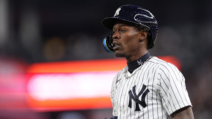 May 1, 2026; Bronx, New York, USA; New York Yankees second baseman Jazz Chisholm Jr. (13) reacts after being called out before replay overturned the play, resulting in an infield single during the third inning against the Baltimore Orioles at Yankee Stadium. Mandatory Credit: Vincent Carchietta-Imagn Images