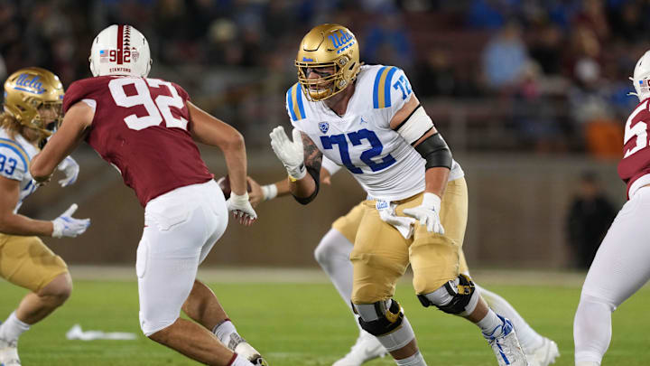 Oct 21, 2023; Stanford, California, USA; UCLA Bruins offensive lineman Garrett DiGiorgio (72) blocks Stanford Cardinal linebacker Lance Keneley (92) during the first quarter at Stanford Stadium. Mandatory Credit: Darren Yamashita-Imagn Images