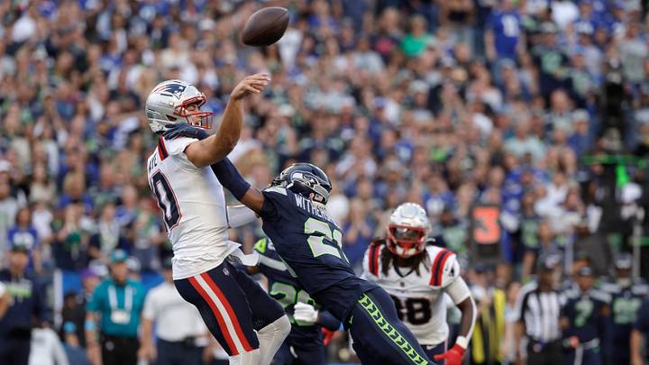 Sep 9, 2026; Seattle, Washington, USA; New England Patriots quarterback Drake Maye (10) throws against Seattle Seahawks cornerback Devon Witherspoon (21) during the first quarter at Lumen Field. Mandatory Credit: Joe Nicholson-Imagn Images Sep 9, 2026; Seattle, Washington, USA; New England Patriots quarterback Drake Maye (10) throws against Seattle Seahawks cornerback Devon Witherspoon (21) during the first quarter at Lumen Field. Mandatory Credit: Joe Nicholson-Imagn Images