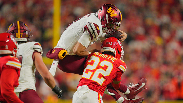 Oct 27, 2025; Kansas City, Missouri, USA; Kansas City Chiefs cornerback Trent McDuffie (22) tackles Washington Commanders quarterback Marcus Mariota (8) during the second quarter of the game at GEHA Field at Arrowhead Stadium. Mandatory Credit: Jay Biggerstaff-Imagn Images Oct 27, 2025; Kansas City, Missouri, USA; Kansas City Chiefs cornerback Trent McDuffie (22) tackles Washington Commanders quarterback Marcus Mariota (8) during the second quarter of the game at GEHA Field at Arrowhead Stadium. Mandatory Credit: Jay Biggerstaff-Imagn Images