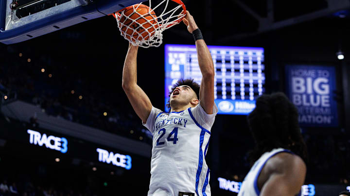Nov 21, 2025; Lexington, Kentucky, USA; Kentucky Wildcats center Malachi Moreno (24) dunks the ball during the second half against the Loyola (MD) Greyhounds at Rupp Arena at Central Bank Center. Mandatory Credit: Jordan Prather-Imagn Images