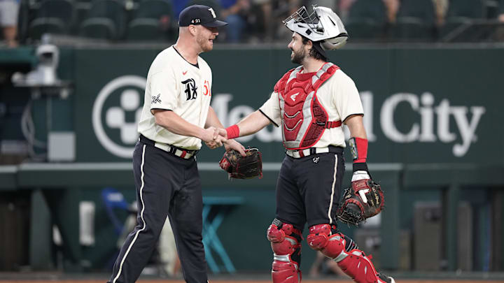 Aug 5, 2023; Arlington, Texas, USA; Texas Rangers relief pitcher Will Smith (51) and catcher Austin