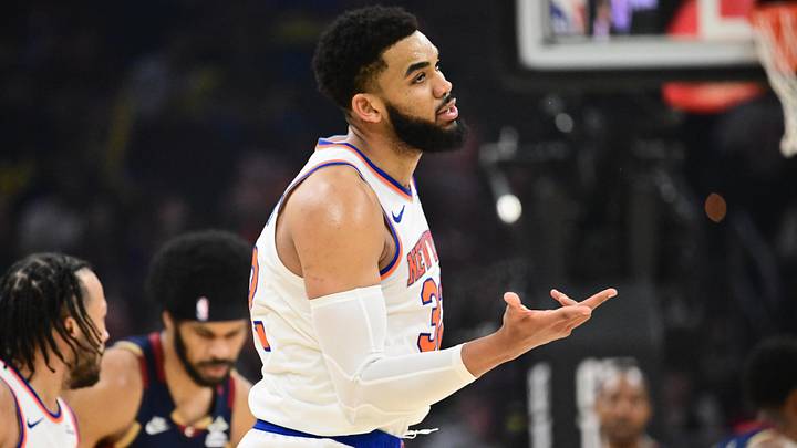 May 25, 2026; Cleveland, Ohio, USA; New York Knicks center Karl-Anthony Towns (32) reacts in the third quarter against the Cleveland Cavaliers during game four of the eastern conference finals for the 2026 NBA playoffs at Rocket Arena. Mandatory Credit: Ken Blaze-Imagn Images