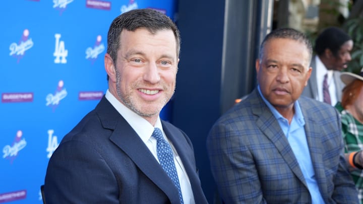 Dec 14, 2023; Los Angeles, CA, USA; Los Angeles Dodgers president of baseball operations Andrew Friedman (left) and manager Dave Roberts at press conference at Dodger Stadium. Mandatory Credit: Kirby Lee-Imagn Images
