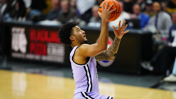 Feb 25, 2026; Boulder, Colorado, USA; Kansas State Wildcats guard PJ Haggerty (4) shoots the ball in the first half against the Colorado Buffaloes at the CU Events Center.