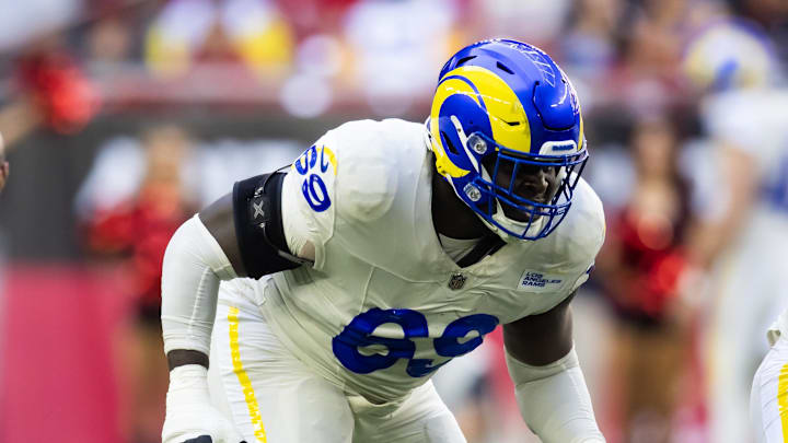 Nov 26, 2023; Glendale, Arizona, USA; Los Angeles Rams guard Kevin Dotson (69) against the Arizona Cardinals at State Farm Stadium. Mandatory Credit: Mark J. Rebilas-Imagn Images Nov 26, 2023; Glendale, Arizona, USA; Los Angeles Rams guard Kevin Dotson (69) against the Arizona Cardinals at State Farm Stadium. Mandatory Credit: Mark J. Rebilas-Imagn Images