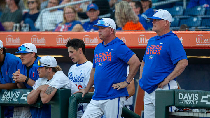 Florida head coach Kevin OÕSullivan and assistant coach Tom Slater watch from the dugout against FSU , March 10, 2026, at Condron Family Ballpark in Gainesville, Florida. [Cyndi Chambers/ Gainesville Sun] 2026