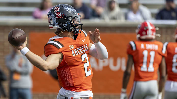 Feb 1, 2025; Mobile, AL, USA; American team quarterback Jaxson Dart of Ole Miss (2) warms up before the 2025 Senior Bowl football game against the National Team at Hancock Whitney Stadium.  