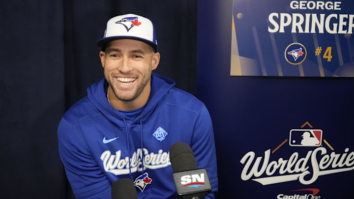 Oct 23, 2025; Toronto, ON, Canada; Toronto Blue Jays designated hitter George Springer (4) smiles after a question at the World Series media day interviews at Rogers Centre. 