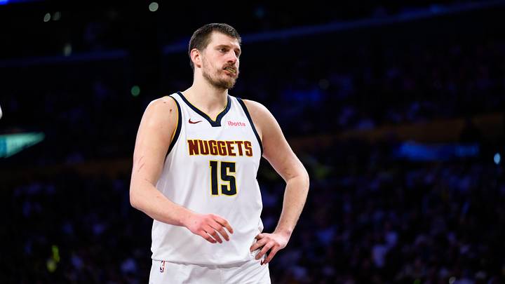 Mar 14, 2026; Los Angeles, California, USA; Denver Nuggets center Nikola Jokic (15) looks on during the first half against the Los Angeles Lakers at Crypto.com Arena. Mandatory Credit: William Liang-Imagn Images