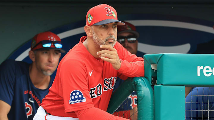 Feb 22, 2026; Fort Myers, Florida, USA; Boston Red Sox manager Alex Cora (13) looks on from the dugout during the third inning against the Toronto Blue Jays  at JetBlue Park at Fenway South. Mandatory Credit: Kim Klement Neitzel-Imagn Images