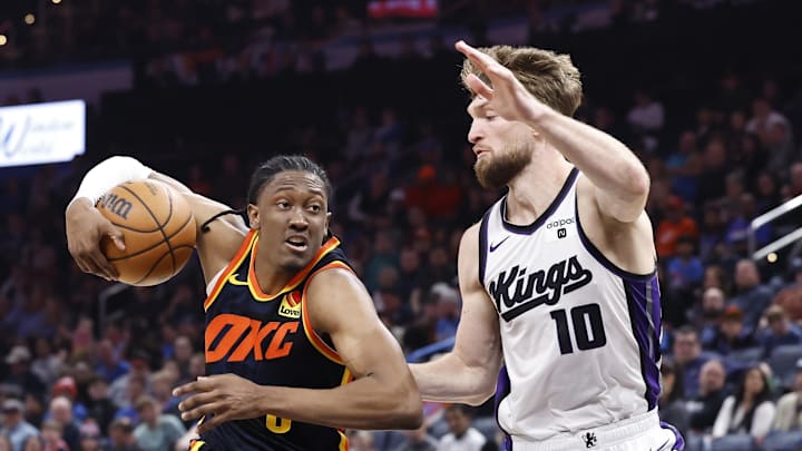 Feb 11, 2024; Oklahoma City, Oklahoma, USA; Oklahoma City Thunder forward Jalen Williams (8) drives to the basket beside Sacramento Kings forward Domantas Sabonis (10) during the second half at Paycom Center. Mandatory Credit: Alonzo Adams-Imagn Images Feb 11, 2024; Oklahoma City, Oklahoma, USA; Oklahoma City Thunder forward Jalen Williams (8) drives to the basket beside Sacramento Kings forward Domantas Sabonis (10) during the second half at Paycom Center. Mandatory Credit: Alonzo Adams-Imagn Images