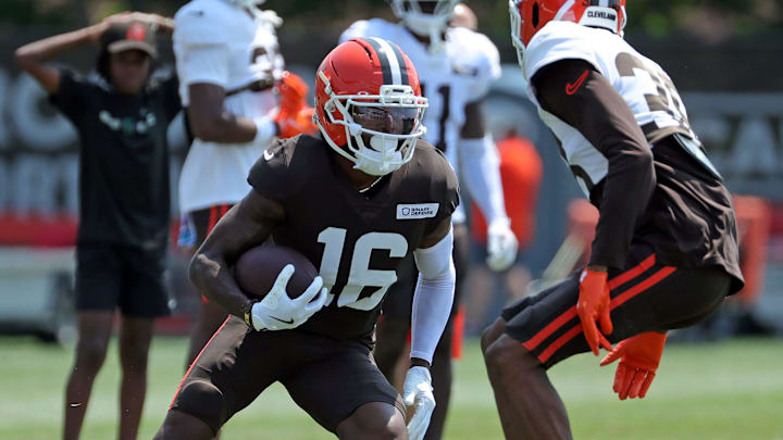 Cleveland Browns wide receiver Diontae Johnson (16) makes a move on cornerback Kennan Isaac (38) during NFL training camp at CrossCountry Mortgage Campus, Friday, Aug. 1, 2025, in Berea, Ohio.