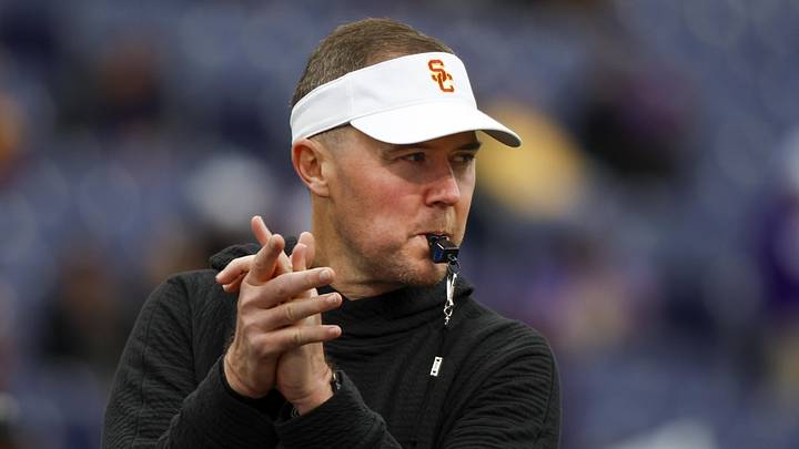 Nov 2, 2024; Seattle, Washington, USA; USC Trojans head coach Lincoln Riley watches pregame warmups against the Washington Huskies at Alaska Airlines Field at Husky Stadium. Mandatory Credit: Joe Nicholson-Imagn Images