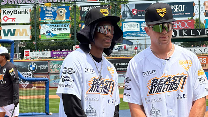 Eagles teammates DeVonta Smith and Cooper DeJean get ready for the home run contest at Smith's 5th annual Celebrity All-Star Game on June 28. 2025 in Allentown.