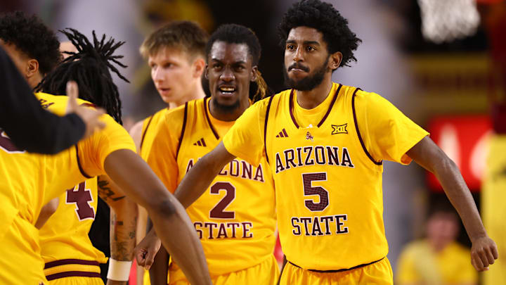 Jan 24, 2026; Tempe, Arizona, USA; Arizona State Sun Devils guard Maurice Odum (5) celebrates with teammates against the Cincinnati Bearcats in the second half at Desert Financial Arena. Mandatory Credit: Mark J. Rebilas-Imagn Images