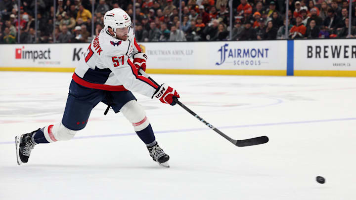 Mar 11, 2025; Anaheim, California, USA; Washington Capitals defenseman Trevor van Riemsdyk (57) shoots during the first period Anaheim Ducksa at Honda Center. Mandatory Credit: Jason Parkhurst-Imagn Images